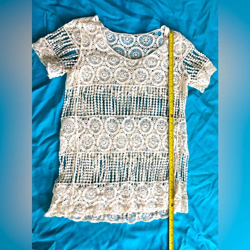 Phase one crocheted cream top.